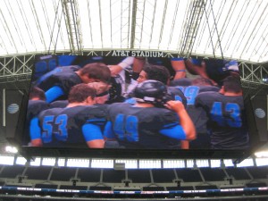The BNHS team on the jumbotron after taking the field